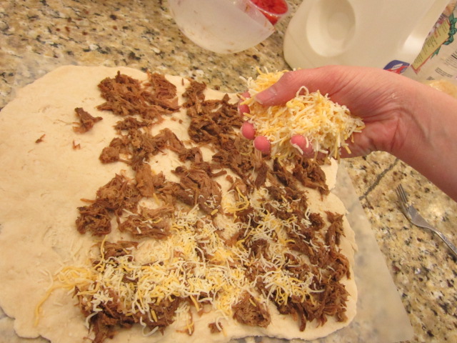Biscuit with shredded beef and cheese