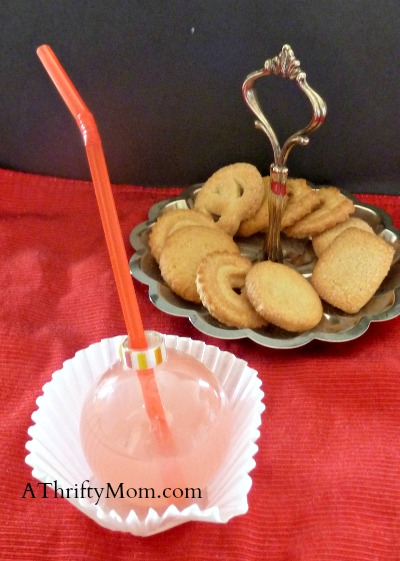 clear ornaments as cups~party ideas, #party,#christmas, #ornaments, , #christmasparty, #easydecor, #thriftydecor, #partyplanning, #newyears, #officeparty, #thriftytips