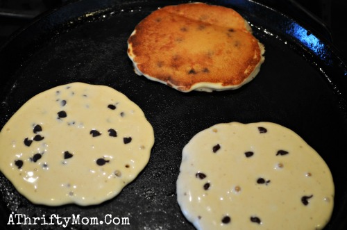 Peanut Butter and Chocolate Pancakes, a yummy twist on your standard pancake.  Easy Breakfast recipe sure to make your family smilke #Pancakes #PeanutButter #Chocolate