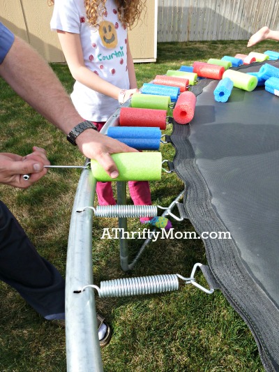 replace a worn out trampoline safety pad with pool noodles ~ Easy DIY, #diy, #poolnoodles,#trampoline, #homeimprovement