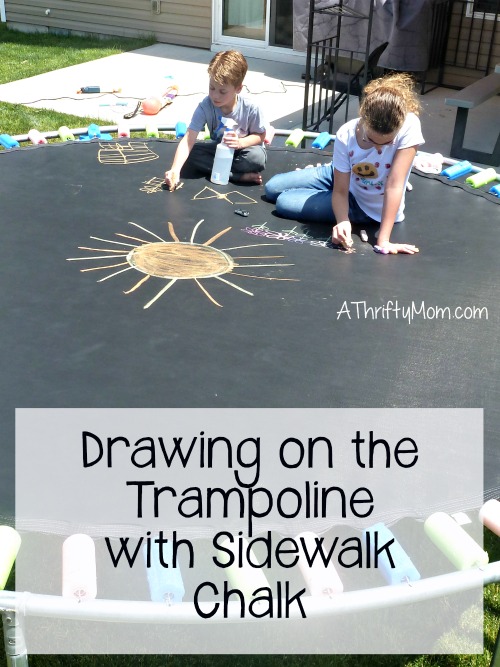 drawing on the trampoline with sidewalk chalk, #thriftysummerfun, #keepingkidsentertained, #summerfun, #summer, #chalk, #sidewalkchalk