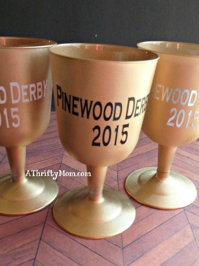 quick, inexpensive trophy idea, great for a pinewood derby, #trophy, #spraypaint, #plasticcup, #vinyl, #easycraft, #thriftycraft,#thriftytrophy, #scouting