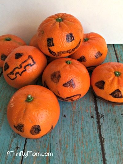 orange jack o lanterns, healthy Halloween treats, jack o lantern, Halloween, oranges, Halloween snacks, Halloween treats