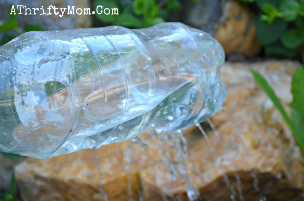 Live on Less DIY 2 Liter Bottle Sprinkler to water flowers Upcycle A Thrifty Mom